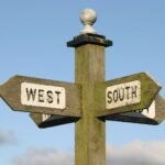 green wooden signage